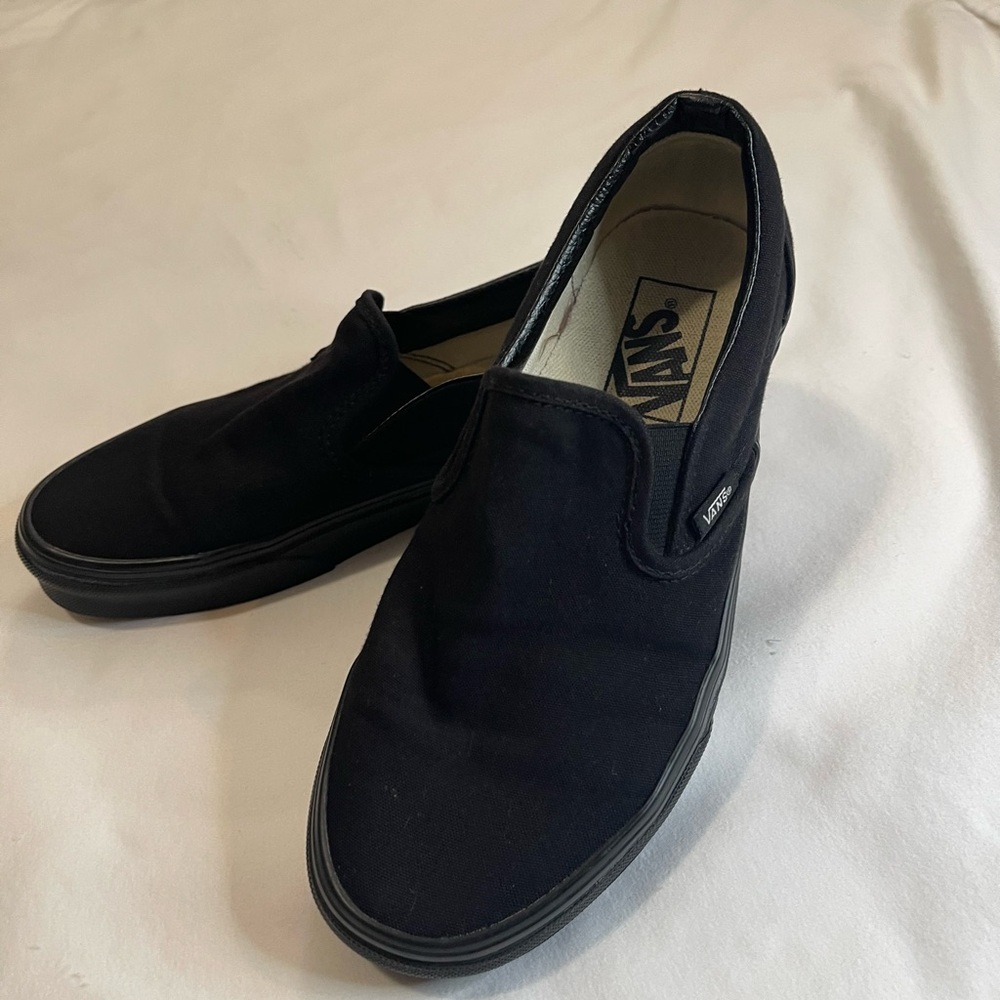 Vans slip on black size 7 woman’s.